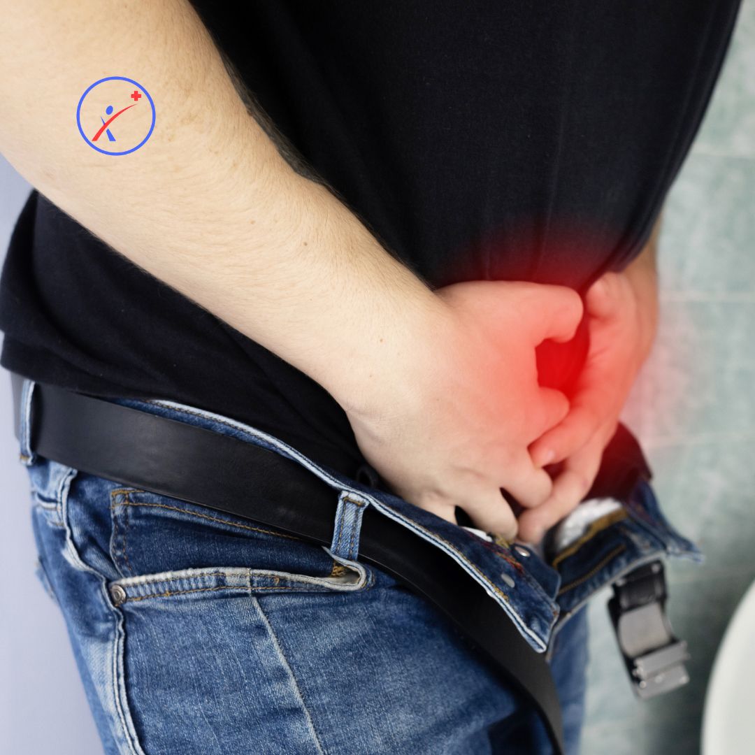 Moški z odpetim pasom hlač se drži za distalni del abdomna. Na shematski način je prikazana težava abdominalno spodaj.